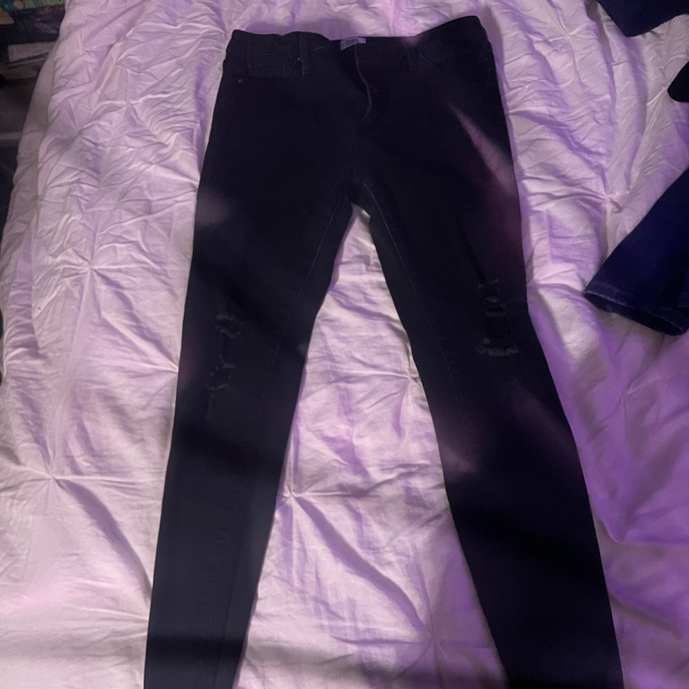 black ripped jeans